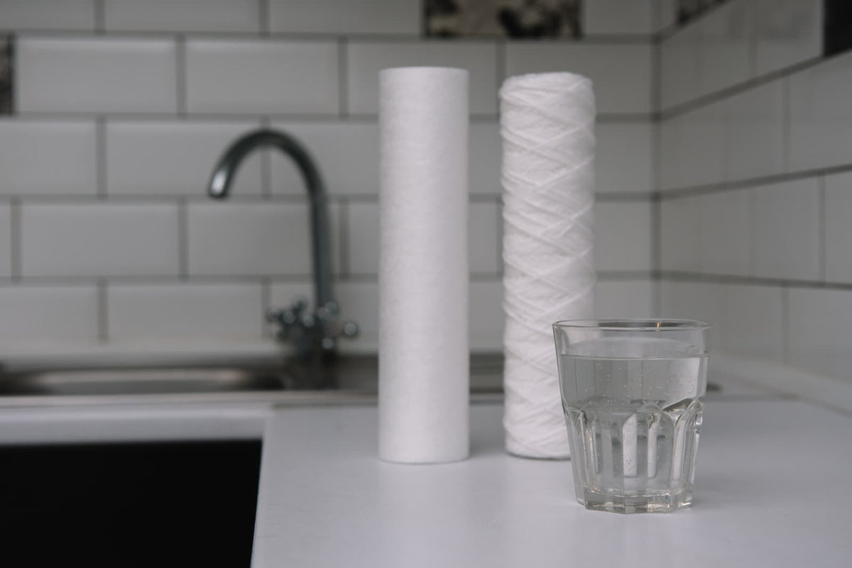 Side-by-side diagram showing countertop and under-sink reverse osmosis system placement.